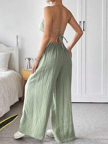 Mono sin espalda, diseño monocromo, pantalones holgados, estilo sensual. - Verde - Ver 1