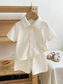 SHEIN 2pcs/Set Spring & Summer New Casual Style Solid Color Jacquard Texture Button Pocket Collar Shirt & Elastic Waist Pleated Shorts Matching Comfortable Baby Boy Outfit, Kid Clothes,Toddler Clothes, Baby Outfit,Toddler Coat ,Toddler Shorts,6M-3T Baby Boy Shirt And Short Set Baby Boy Short Sleeve Suits Neutral Baby Clothes Unisex Baby Boy Casual Outfit  Baby Collar Shirt Baby Button Shirt Black Toddler Shirt Unisex Baby Clothes