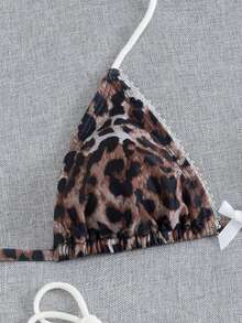 Costavie Swim Vcay 新款优雅休闲三件套泳装，复古 Y2K 热辣女孩风格棕色豹纹蕾丝边挂脖三角比基尼套装，饰有蝴蝶结细节，搭配平角热裤，性感透视网纱褶皱系带两件式泳装，适合春夏海滩度假、泳池派对、音乐节、热带度假、蜜月之旅、七月四日庆祝活动和海滨早午餐等场合，尽显复古魅力。 - 棕色 - 查看 4