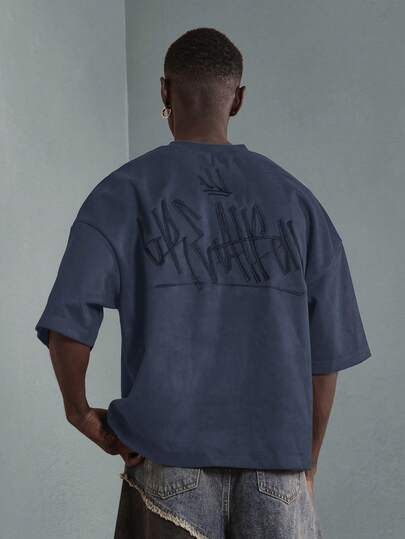 SUMWON Áo croptop dáng rộng với họa tiết graffiti in ở lưng, cổ tròn, tay ngắn, phong cách đường phố mùa hè thường ngày, dáng thoải mái, tuyên ngôn thời trang đô thị.