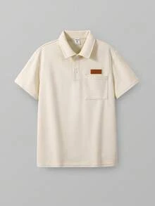 青少年男童休闲街头风纯色纹理面料装饰细节百搭舒适纯色 Polo 领短袖 Polo 衫，适合通勤、上学、休闲、度假、运动、聚会、春夏穿着。 - 杏色 - 查看 2