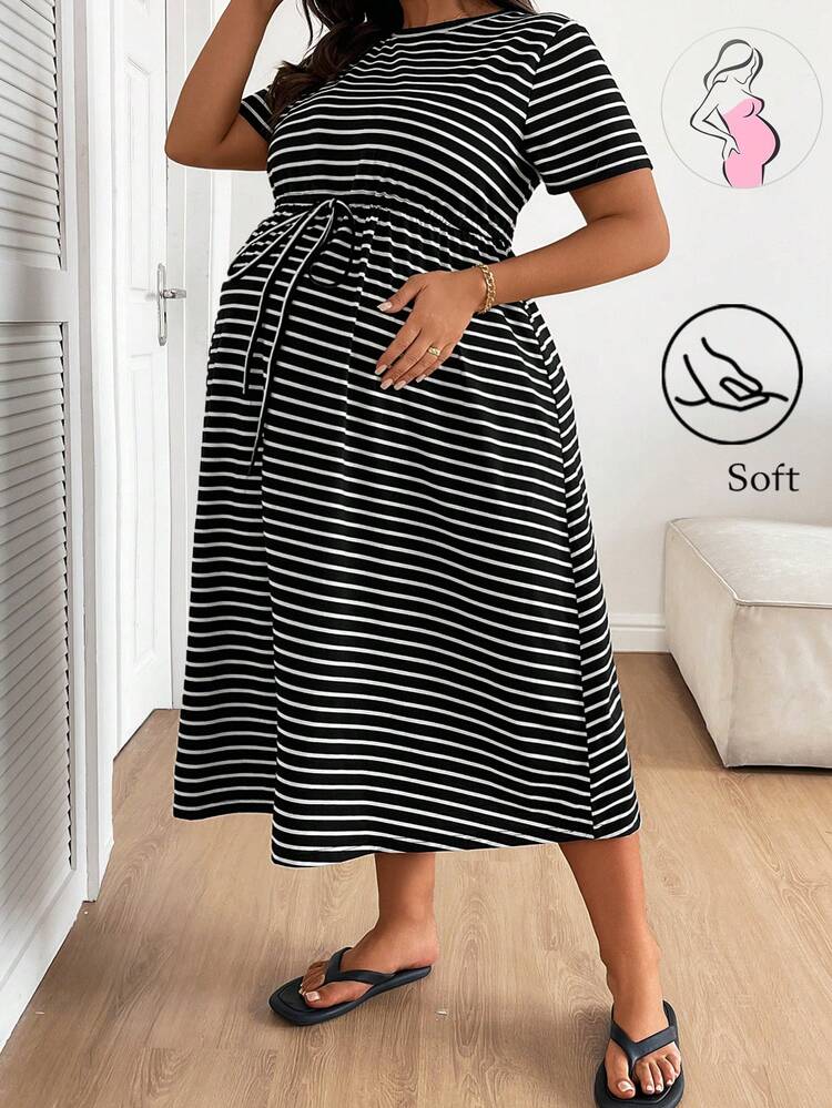 black white maternity dress Angel Polka Dot Maternity/Nursing A precise and flattering cut gives this dress an elegant and impressive touch that makes it a perfect evening dress. Black Maternity Long Sleeve Split