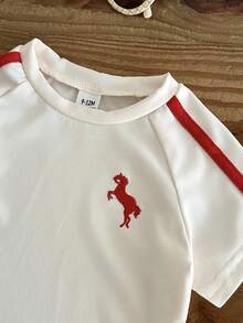 SHEIN Bộ đồ mùa xuân 2 món cho bé gái, kiểu dáng thường ngày năng động và thoải mái, thêu họa tiết, gồm áo tay phồng ngắn cổ tròn và quần dài kẻ sọc. - trắng - Xem 7