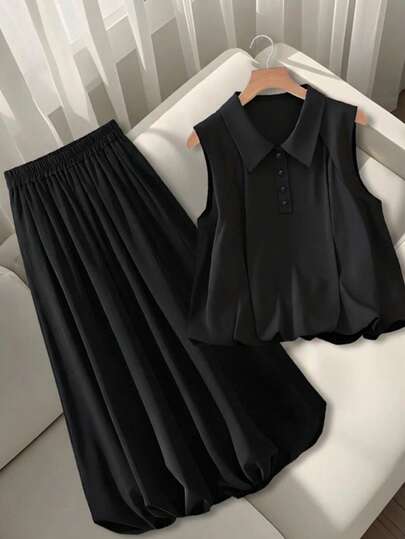 Franclia 黑色翻领半开襟无袖露脐背心搭配高腰灯笼裙，时尚两件套女装