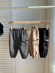 SHEIN Quần cargo dáng rộng thoải mái, cạp chun in chữ cho bé trai - Nhiều màu - Xem 5