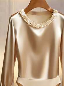 Franclia 2026春秋新款圆领串珠连体衣，针织面料亲肤舒适，杏色，长袖修身连体衣，可外穿或内搭，通勤百搭，女士秋冬连体衣套装，新款连体衣套装，长袖开衩纽扣装饰。 - 杏色 - 查看 3