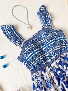 这款少女印花褶裥连衣裙，采用印花图案、喇叭袖和飘逸设计，并饰有少女连衣裙的点缀，适合派对、旅行、校园郊游和多季节穿着。 - 彩色 - 查看 5