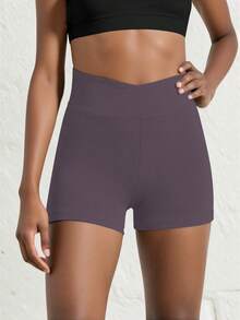 SHEIN Quần short thể thao cho bé gái tuổi teen, màu trơn, kiểu dáng tối giản, cạp chéo, chất liệu co giãn 4 chiều, thích hợp cho đạp xe, chạy bộ và tập luyện. - Bụi tím - Xem 5