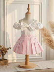 SHEIN Toddler Party 2pcs/ Set Baby Girls Aged 6 Months To 3 Years. It's Elegant And Charming For Summer, With A Relaxed And Casual Fit, Featuring A Short-Sleeved Off-The-Shoulder Top And An Embossed Pleated Skirt - Pink - View 1