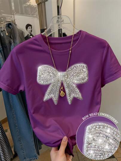 Resyla 女士常规短袖圆领T恤，饰有优雅蝴蝶结和亮片装饰