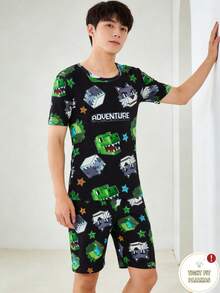 SHEIN 一套男童游戏主题睡衣，紧身款，黑色底，印有恐龙和狼头图案，短袖上衣和短裤，款式活泼，面料柔软舒适，可机洗，适合小男孩穿着。 - 黑色 - 查看 3