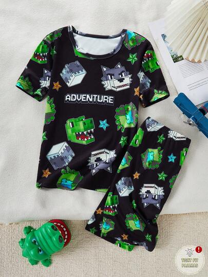 SHEIN GraphicGems 一套男童游戏主题睡衣，紧身款，黑色底，印有恐龙和狼头图案，短袖上衣和短裤，款式活泼，面料柔软舒适，可机洗，适合小男孩穿着。