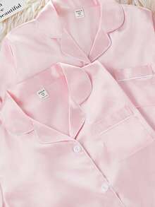 少女睡衣套装 - 两件套粉色缎面长袖翻领睡衣，包含长裤和短裤，适合大女孩穿着，轻盈顺滑，优雅舒适，四季皆宜，是睡前和假期的理想之选。2026 年必备礼物，舒适透气，可机洗，是晨间日常穿着的理想选择。 - 粉色 - 查看 4