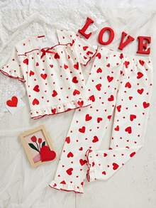 女童两件套睡衣：短袖上衣，饰有蝴蝶结和爱心印花，荷叶边下摆；宽松长裤，荷叶边下摆。 - 杏色 - 查看 4