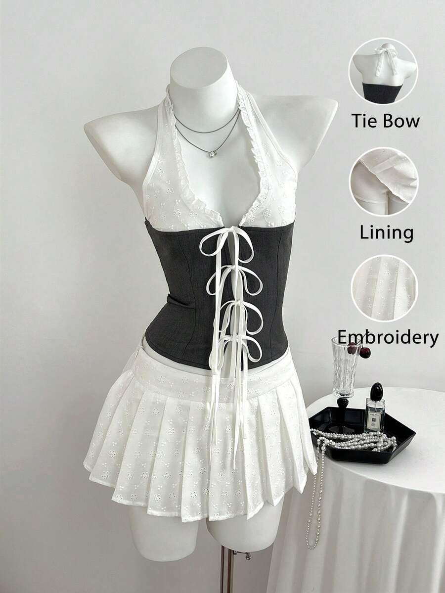 Elamini Bộ đồ hai mảnh mùa hè thoải mái dành cho nữ, với họa tiết chắp vá, phối màu và thêu theo phong cách Y2K, gồm chân váy xếp ly và áo hở lưng, thích hợp cho tiệc năm mới. - trắng - Xem 1