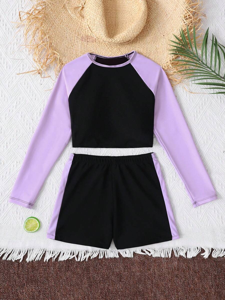 SHEIN Conjunto de traje de baño informal para niña preadolescente con top de mangas raglán de cuello redondo y bloques de color, y shorts - Morado - Ver 1
