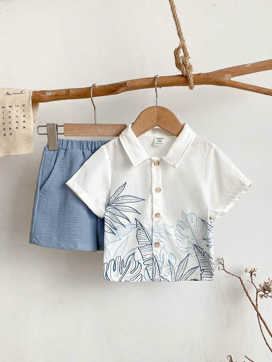 SHEIN 2件套男婴夏季休闲度假可爱白色树叶图案宽松短袖衬衫和松紧腰短裤套装,适合生日派对、晚宴、演出、婚礼、迎婴派对、一周岁生日庆祝活动。 - 彩色 - 查看 1