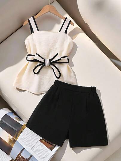 Conjunto de camiseta para niñas preadolescentes, conjunto de camisola negra con estilo para niñas preadolescentes con ribete blanco, diseño de cinturón en la cintura, combinado con pantalones cortos, estilo simple de transporte para el verano