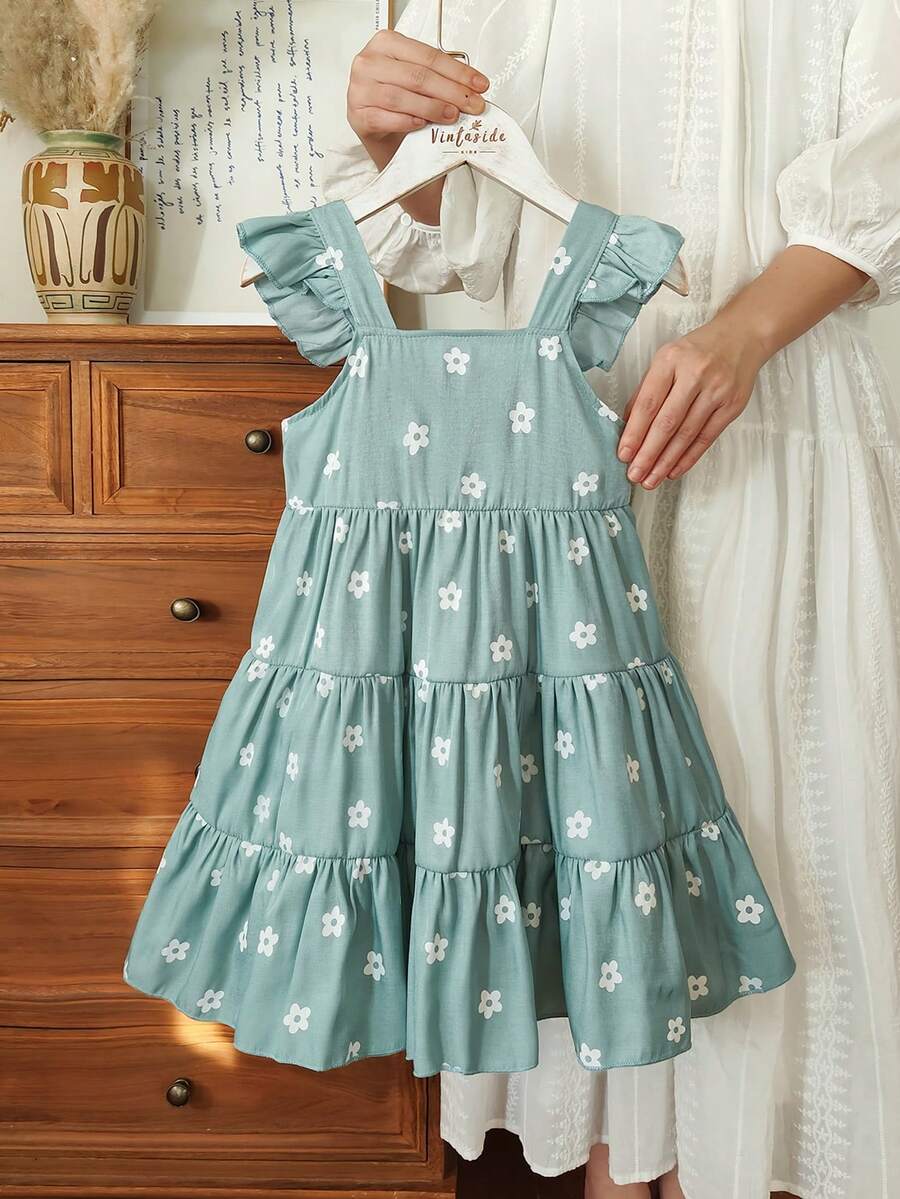 Vintaside Kids Đầm dài cổ yếm kiểu vườn hè cho bé gái, chất liệu vải dệt, dáng chữ A, với tông màu xanh phấn nhẹ nhàng và thiết kế cổ yếm tinh tế. - màu xanh lá - Xem 1