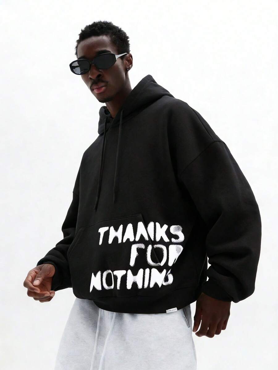SUMWON 必备宽松版型套头连帽衫，带中央口袋，印有“Thanks For Nothing”字样，休闲家居服 - 黑色 - 查看 1