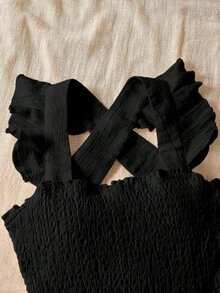 少女休闲优雅学院风连衣裙，绿色无袖褶皱A字裙，带蝴蝶结和交叉后背绑带，适合外出、度假、上学、春夏穿着。 - 黑色 - 查看 7