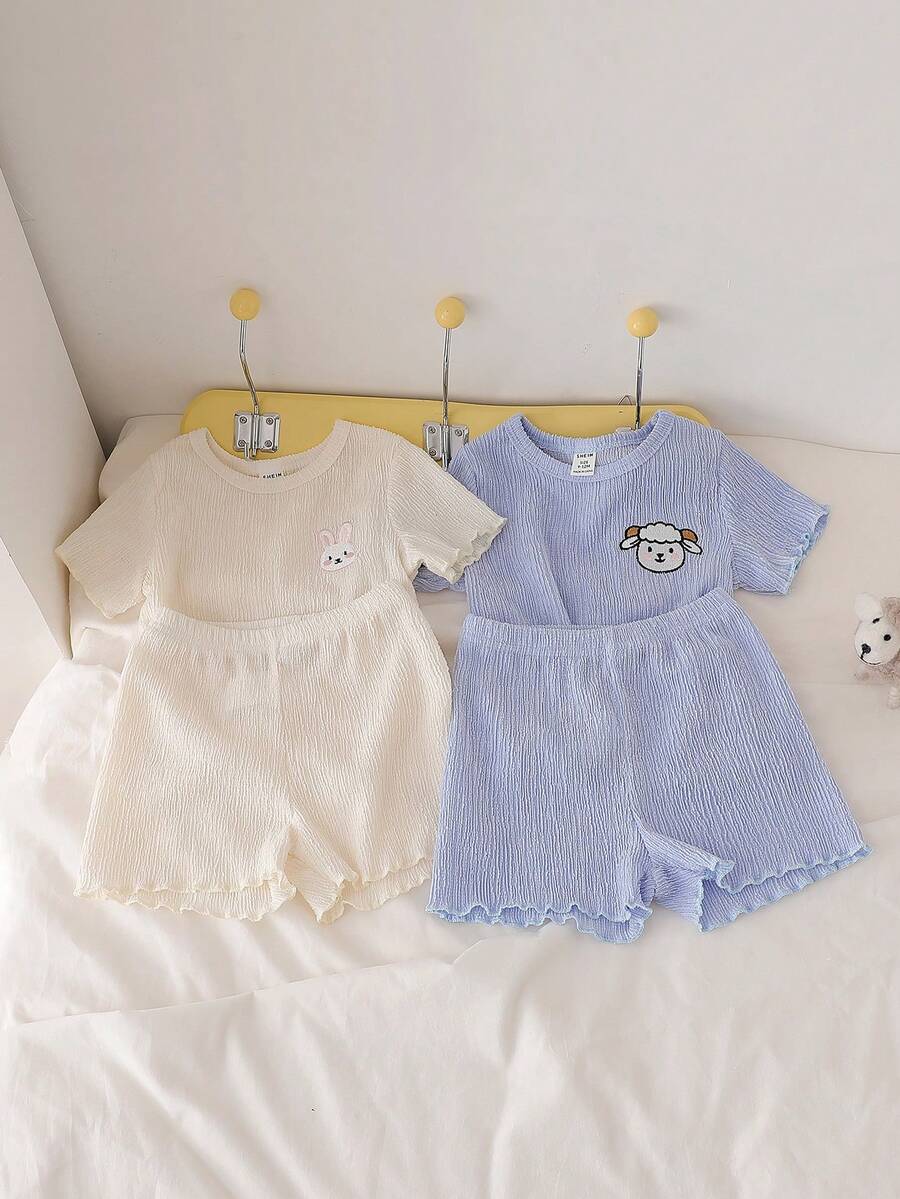 Bộ đồ ngủ 4 món cho bé gái, họa tiết thỏ và cừu dễ thương, thêu trang trí, cổ tròn, tay áo và gấu áo xếp ly, tay ngắn và quần short, thoải mái, màu xanh dương và màu mơ. - Xanh và trắng - Xem 1