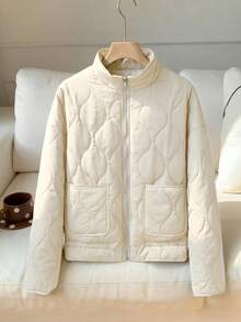 Comfortcana Abrigo acolchado de manga larga con cuello alto, bolsillos y estampado de diamantes en color marfil para mujer, ropa de invierno