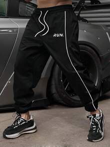 GymBeat Quần thể thao nam in họa tiết, quần jogger nam, quần tập gym, quần nỉ đen, quần áo tập gym rộng rãi. - màu đen - Xem 1