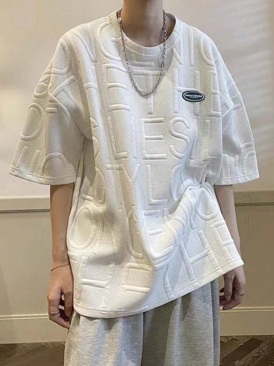 Claim Dot Camiseta de hombro caído con letras en relieve y parches - Blanco - Ver 1