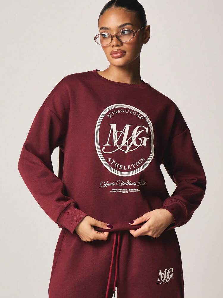 MISSGUIDED Oversized Burgundy Crew Neck Sweatshirt With Large Circle Logo Print For Casual Fall Winter Comfort