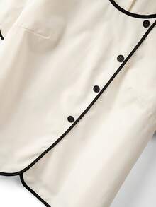 GlowEve CURVE Conjunto informal de 2 piezas para mujer talla grande con camisa de cuello redondo en color albaricoque con ribete de contraste y manga corta, y pantalón ancho y suelto de pierna ancha en color negro - Albaricoque - Ver 7