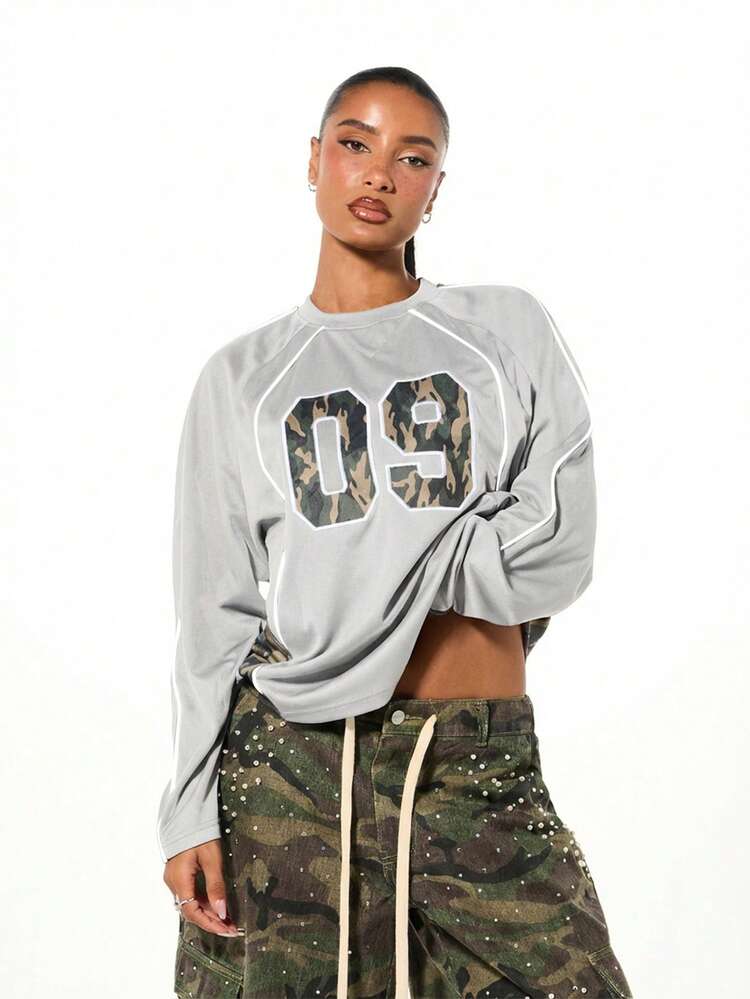 SUMWON WOMEN Oversized Raglan Sleeve Football Jersey With Camo Print
