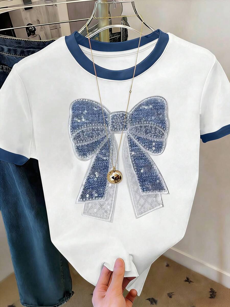 SHEIN Camiseta de manga corta con cuello redondo, parches de lazo y lentejuelas en bloques de color para mujer - Blanco - Ver 1