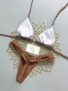 Swim Mod Bộ bikini chấm bi nâu, ngọt ngào và dễ thương, thích hợp cho kỳ nghỉ biển, mùa xuân/hè, bộ sưu tập đồ bơi nữ mới năm 2026. Phù hợp cho đi học, kỳ nghỉ, hẹn hò, trà chiều, phong cách miền Tây, du thuyền, bãi biển, đảo, du lịch đường bộ, mọi mùa, lễ hội âm nhạc, kỳ nghỉ Boho, kỳ nghỉ Bohemian, mùa thu thư giãn, phong cách Boho miền Tây, áo bikini thanh lịch dành cho nữ, bộ bikini hai mảnh dây mảnh cổ yếm màu nâu chấm bi trắng ngẫu nhiên, kiểu dáng ngọt ngào dễ thương, cạp cao, 2 mảnh, bộ bikini màu nâu, bikini xếp ly, bikini tam giác. - màu nâu - Xem 3