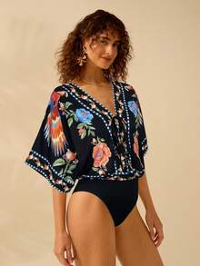 CAJUNI Mono de verano de estilo boho con estampado de loro de colores y flores tropicales, cuello en V profundo anudado, para vacaciones y ocio en la playa