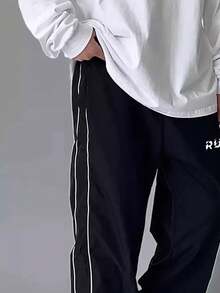 GymBeat Quần thể thao nam in họa tiết, quần jogger nam, quần tập gym, quần nỉ đen, quần áo tập gym rộng rãi. - màu đen - Xem 4