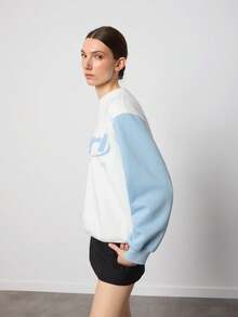 SURIMA بلوزة رياضية فضفاضة بأكمام طويلة ذات لونين أبيض وأزرق فاتح مناسبة للخريف/الشتاء للنساء