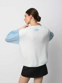 SURIMA بلوزة رياضية فضفاضة بأكمام طويلة ذات لونين أبيض وأزرق فاتح مناسبة للخريف/الشتاء للنساء