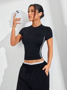 Velisys Áo thun tập yoga/thể dục dành cho nữ, ôm sát, kiểu dáng thường ngày, có sọc trắng bên hông, gợi cảm và thoải mái, phù hợp cho đi làm, chạy bộ ngoài trời, áo tay ngắn ôm sát có lưới bên hông. - Đen và trắng - Xem 5