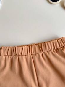 SHEIN Playful Pals 2 pièces/Set Chemise à manches courtes à col rond boutonnée rayée colorée en tricot côtelé élastique avec poche + Pantalon droit ample à taille élastique kaki unicolore, tenue décontractée rétro, convient pour les sorties quotidiennes d'été ou les voyages - Kaki - Voir 6