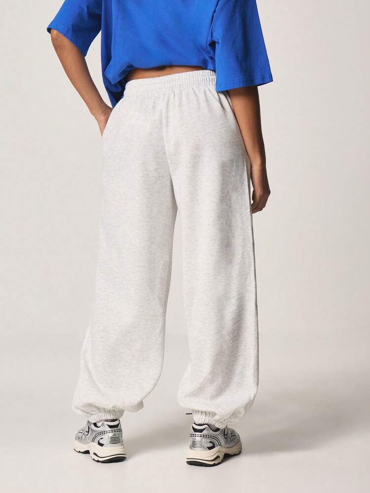 MISSGUIDED Heathered Light Grey Elastic Cuffed Jogger Sweatpants With Drawstring Waist And Side Pockets For Casual Loungewear Comfort