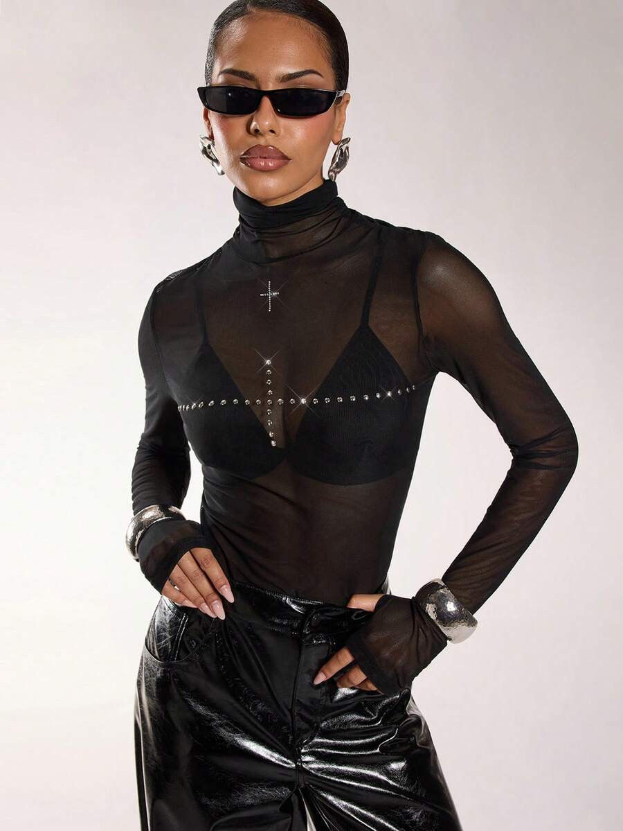 Normani Camiseta de manga larga con cuello alto, malla y tachuelas para mujer, de moda y versátil - Negro - Ver 1
