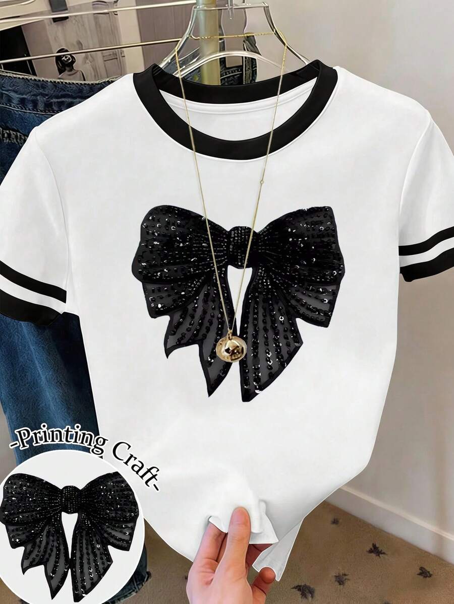 EMERY ROSE Blusas de verano, Camiseta de mujer con lazo negro estampado, Blusa casual de cuello redondo para primavera y verano, Ropa de mujer de manga corta para verano, Camisetas gráficas para mujer - Multicolor - Ver 1