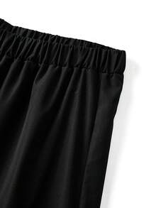 GlowEve CURVE Conjunto informal de 2 piezas para mujer talla grande con camisa de cuello redondo en color albaricoque con ribete de contraste y manga corta, y pantalón ancho y suelto de pierna ancha en color negro - Albaricoque - Ver 5