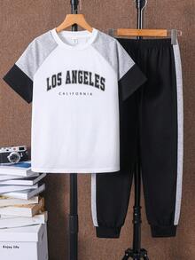 SHEIN Bộ 2 món cho bé trai tuổi teen, gồm áo thun cổ tròn tay ngắn dáng rộng in chữ và quần cạp chun, thích hợp đi làm, đi học, mặc hàng ngày, chơi thể thao, mùa xuân/hè. - Nhiều màu - Xem 3