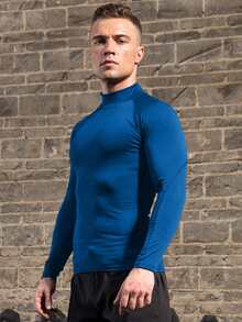 Coreblaze Camiseta deportiva de compresión para hombres con cuello alto y mangas raglán de unicolor - Azul - Ver 3