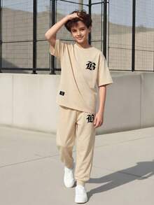 Vacaura 2件套休闲青少年男童字母图案T恤套装，时尚简约设计，适合日常通勤。 - 杏色 - 查看 10