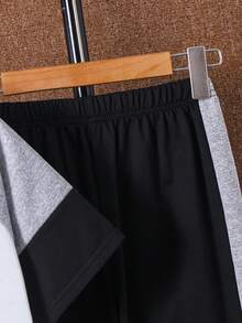 SHEIN Bộ 2 món cho bé trai tuổi teen, gồm áo thun cổ tròn tay ngắn dáng rộng in chữ và quần cạp chun, thích hợp đi làm, đi học, mặc hàng ngày, chơi thể thao, mùa xuân/hè. - Nhiều màu - Xem 7