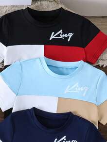 SHEIN Set de 2 piezas: Conjunto cómodo y lindo para niño pequeño: Camiseta de manga corta con bloqueo de color y estampado en inglés + Pantalones cortos a juego. Disponible en 3 opciones de color elegantes. Ideal para jugar, salir o uso diario - Tela cómoda, diseño fácil de poner y quitar, perfecto para los talla grande pequeños. - Multicolor - Ver 3