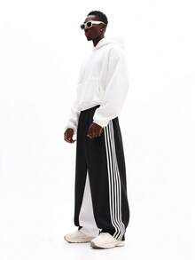 SUMWON Quần jogger ống rộng phối sọc bên hông, dáng thoải mái, thích hợp mặc ở nhà, có dây rút ở eo, phong cách thường ngày năng động, thoải mái để mặc hàng ngày. - màu đen - Xem 4